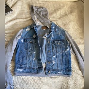 Ripped jean jacket with sweatshirt hood and sleeves